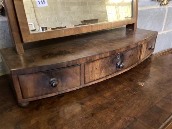 A Regency mahogany bow front toilet mirror, width 65cm, height 63cm